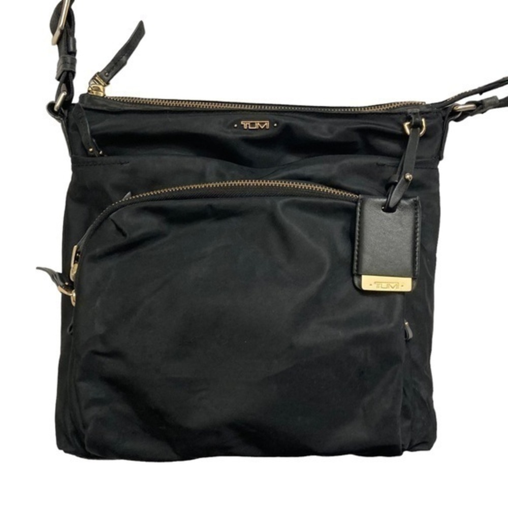 Tumi black nylon and leather messenger crossbody bag
